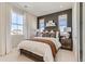 Bedroom featuring natural light, a neutral palette, and stylish accents at 9382 Quaker St, Arvada, CO 80007