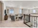 Spacious bonus room with natural lighting and comfortable seating area at 9382 Quaker St, Arvada, CO 80007