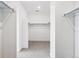 Bright walk-in closet with neutral carpet and ample storage space for an organized wardrobe at 9382 Quaker St, Arvada, CO 80007