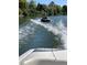 People tubing on the lake, taken from the boat at 4790 W Evans Ave, Denver, CO 80219