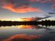 Sunset reflected over the water in this waterfront community at 4790 W Evans Ave, Denver, CO 80219