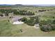 Sprawling property featuring a charming home, accessory building, and ample land at 4002 Bell Mountain Dr, Castle Rock, CO 80104