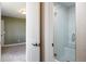 Bathroom features a glass enclosed shower stall with built-in bench and white subway tile at 4002 Bell Mountain Dr, Castle Rock, CO 80104