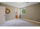 Bedroom features neutral decor, window, and access to an en suite bathroom for added convenience at 4002 Bell Mountain Dr, Castle Rock, CO 80104
