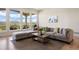 Cozy living room with natural light, comfortable seating and stunning views at 4002 Bell Mountain Dr, Castle Rock, CO 80104