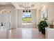 Spacious living area boasts a large window, allowing an abundance of natural light and scenic views at 4002 Bell Mountain Dr, Castle Rock, CO 80104