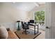 Bright office space with large window and a neutral color scheme creating a calm and productive environment at 4002 Bell Mountain Dr, Castle Rock, CO 80104