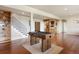 Finished basement with foosball table, hardwood floors, and a wet bar, great for entertaining guests at 4002 Bell Mountain Dr, Castle Rock, CO 80104