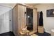 Indoor sauna with wooden bench and glass door, perfect for relaxation and wellness at 4002 Bell Mountain Dr, Castle Rock, CO 80104