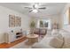 Comfortable living area with hardwood floors, a large window, and modern decor at 9650 Huron St # 12, Thornton, CO 80260