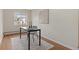 Home office area featuring bright window and black table at 9650 Huron St # 12, Thornton, CO 80260