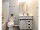 Charming bathroom with modern vanity, subway tile shower, and stylish sliding barn door detail at 10001 E Evans Ave # 72C, Aurora, CO 80247