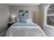 This cozy bedroom includes soft carpet, calming colors, and natural light, creating a peaceful retreat at 10001 E Evans Ave # 72C, Aurora, CO 80247
