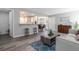 Beautiful living space with bar seating and updated floors at 10001 E Evans Ave # 72C, Aurora, CO 80247