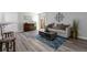Open living room space with hardwood floors at 10001 E Evans Ave # 72C, Aurora, CO 80247