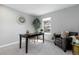 Inviting office space with a classic desk, comfortable chair, and ample natural light at 10001 E Evans Ave # 72C, Aurora, CO 80247
