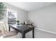 Well-lit office featuring a classic desk, comfortable seating, and a serene, productive environment at 10001 E Evans Ave # 72C, Aurora, CO 80247