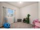 Bright bedroom with natural light, gray carpet, and room to play at 5201 Lumos Ln, Castle Rock, CO 80104