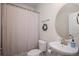 Powder room featuring pedestal sink, and decorative wreath at 5201 Lumos Ln, Castle Rock, CO 80104