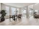 Bright dining room featuring lots of natural light and a sliding door to the outdoors at 3140 Newfound Lake Rd, Berthoud, CO 80513