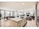 Open kitchen with a center island, stainless steel appliances and an open floor plan at 3140 Newfound Lake Rd, Berthoud, CO 80513