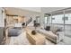 Open-concept living room seamlessly connects to the kitchen and dining area, great for entertaining at 3140 Newfound Lake Rd, Berthoud, CO 80513