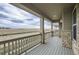 Spacious covered patio with scenic views, perfect for relaxing and enjoying the outdoors at 3140 Newfound Lake Rd, Berthoud, CO 80513