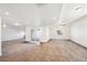 Basement featuring carpet, ceiling fan, recessed lights and sliding glass door leading to the outside at 12597 W Big Horn Cir, Broomfield, CO 80021