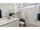 A bathtub with a shower at 12597 W Big Horn Cir, Broomfield, CO 80021