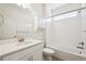 Clean bathroom with white vanity and shower/tub combo at 12597 W Big Horn Cir, Broomfield, CO 80021