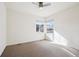 Bright bedroom with neutral colored walls and carpet at 12597 W Big Horn Cir, Broomfield, CO 80021