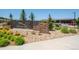 The Lodge community entrance features a modern sign and landscaping at 12597 W Big Horn Cir, Broomfield, CO 80021