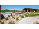 Relaxing community pool with a large patio and umbrellas at 12597 W Big Horn Cir, Broomfield, CO 80021