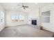 Spacious living room with fireplace and large windows at 12597 W Big Horn Cir, Broomfield, CO 80021