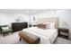 Well-staged bedroom featuring a bed, dresser, and comfortable seating area at 4363 N Raleigh St, Denver, CO 80212