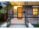 Inviting front porch with decorative iron railings, a secure screen door, and neighborhood views at 4363 N Raleigh St, Denver, CO 80212
