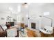 Inviting living room with fireplace, hardwood floors, and ample natural light, creating a cozy atmosphere at 4363 N Raleigh St, Denver, CO 80212