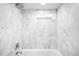 Elegant shower with modern fixtures and marble tiling at 4363 N Raleigh St, Denver, CO 80212