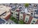 Multi-level building with rooftop decks and parking lot at 2345 Walnut St # 28, Denver, CO 80205