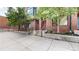 Brick building with landscaped courtyard and private entrance at 2345 Walnut St # 28, Denver, CO 80205