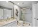 Updated bathroom with walk-in shower and granite countertop at 4291 W Lake N Cir, Littleton, CO 80123