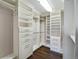 Large walk-in closet with ample shelving and hanging space at 4291 W Lake N Cir, Littleton, CO 80123