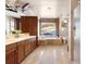 Modern bathroom featuring double vanity, soaking tub with mountain view, and tiled flooring at 10370 Grande Vista Ct, Lone Tree, CO 80124