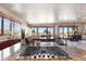 Gourmet kitchen boasts stainless steel appliances, granite counters, and scenic views at 10370 Grande Vista Ct, Lone Tree, CO 80124