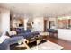 Spacious living room with stylish decor, featuring a comfortable sectional sofa at 10370 Grande Vista Ct, Lone Tree, CO 80124