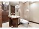Modern powder room featuring a unique stone vessel sink and wood accent wall at 10370 Grande Vista Ct, Lone Tree, CO 80124