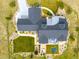 An overhead shot showing the roofline, landscaping, outdoor living area, and trampoline at 3125 Red Kit Rd, Franktown, CO 80116