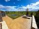 Spacious backyard featuring a stamped concrete patio with a fire pit and seating area, and expansive views at 3125 Red Kit Rd, Franktown, CO 80116