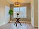 Dining area with a round table and large window at 8468 Thunder Ridge Way # 202, Highlands Ranch, CO 80126