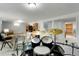 Spacious basement featuring drum set, game table, and sectional couch for relaxation at 978 Mercury Cir, Lone Tree, CO 80124